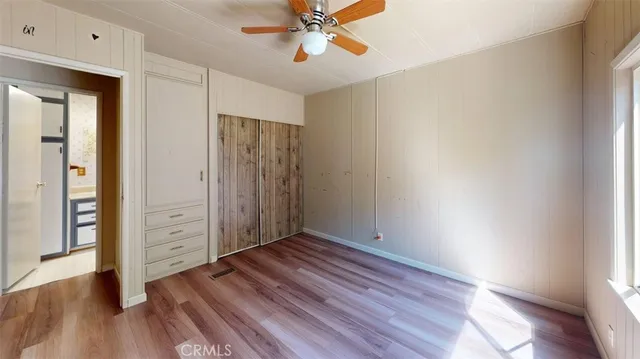 a view of a backyard with sitting area