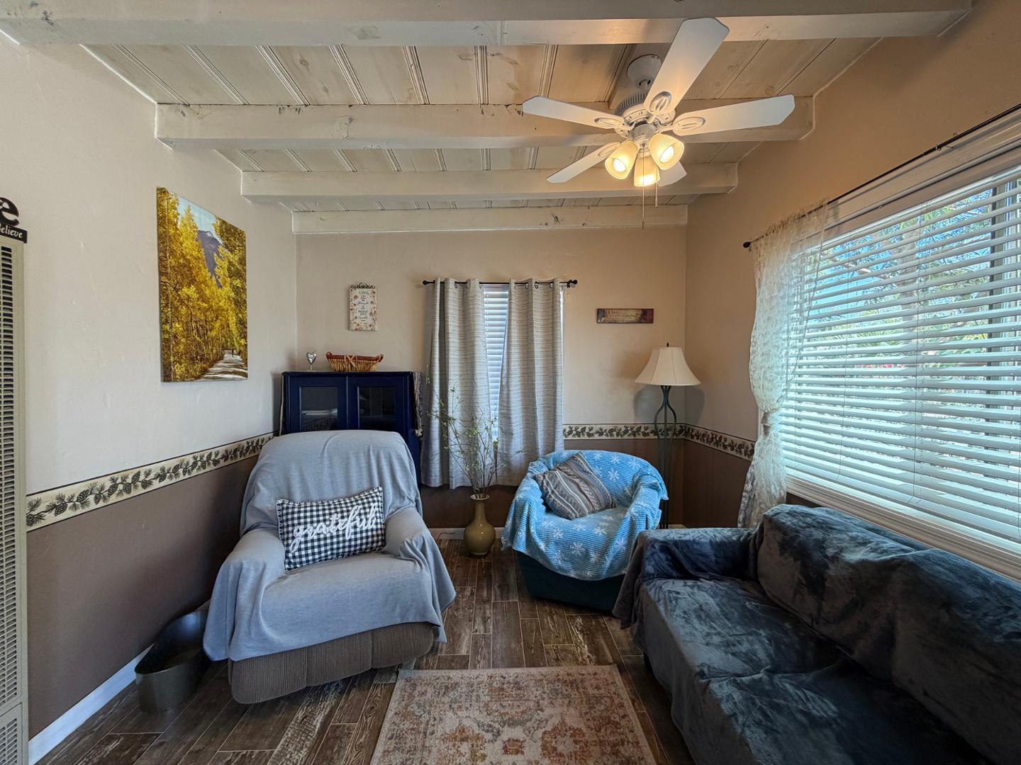 9502 North 2nd Place Phoenix, AZ 85020 - Photo 16 of 21 a living room with furniture and a window
