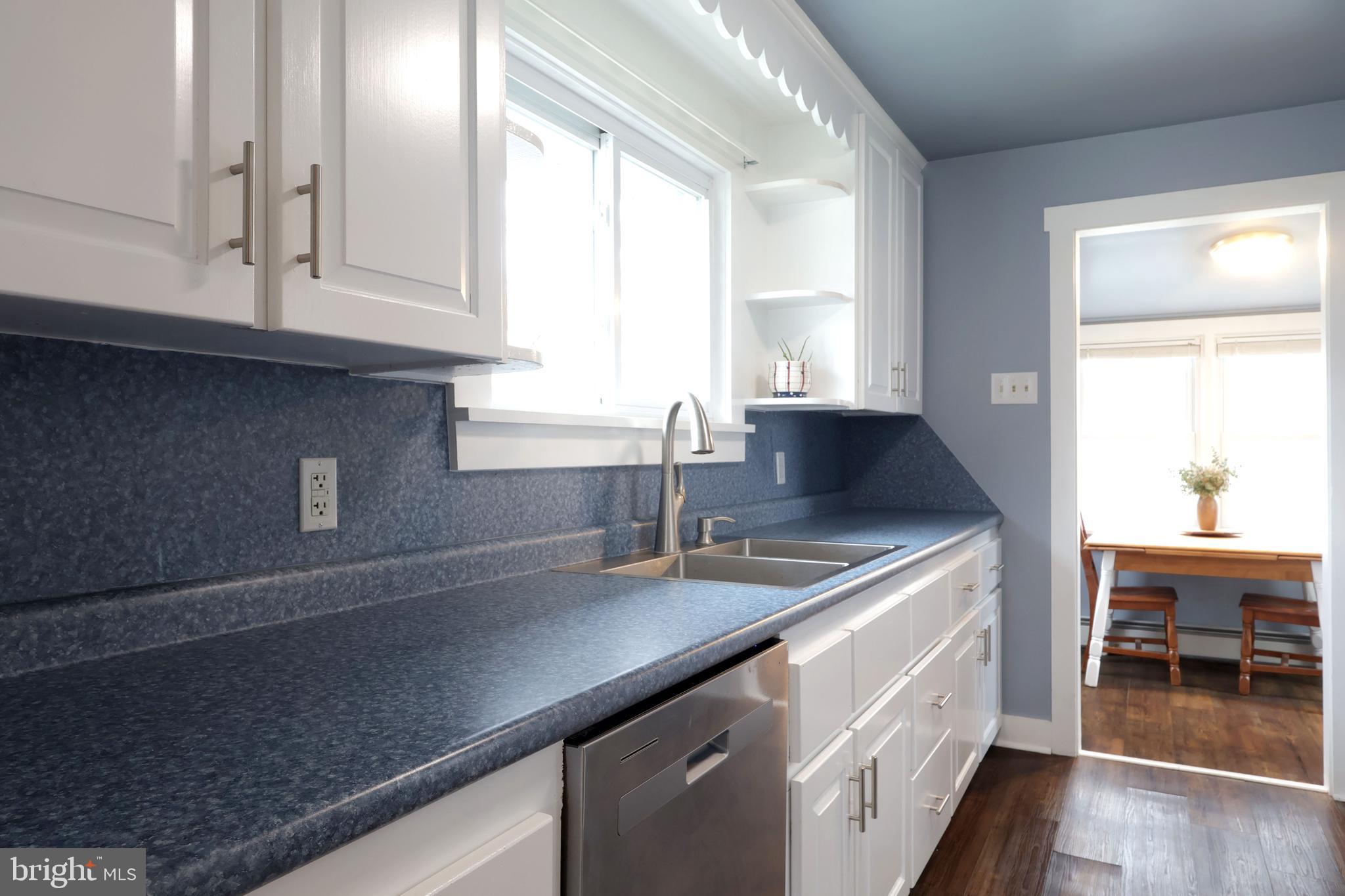 746 South Nixon Road Pine Grove Mills, PA 16868 - Photo 11 of 38 a kitchen with a sink and cabinets