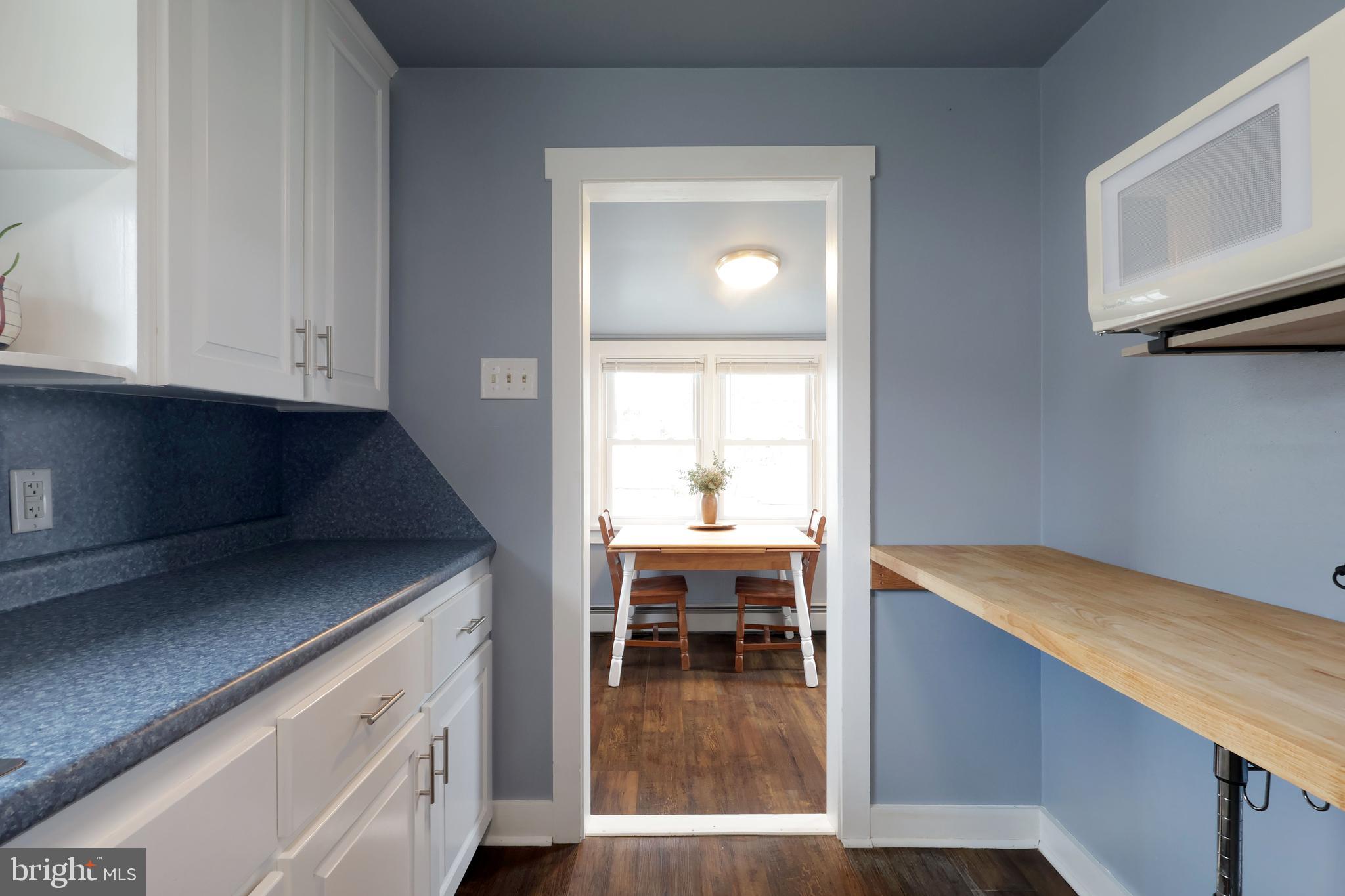 746 South Nixon Road Pine Grove Mills, PA 16868 - Photo 15 of 38 a view of kitchen and dining area with chandelier
