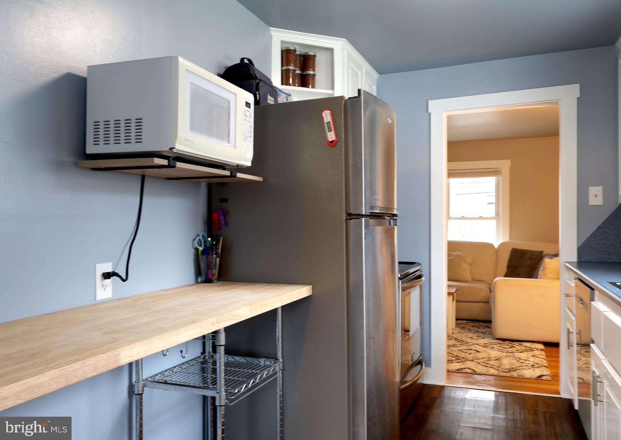 746 South Nixon Road Pine Grove Mills, PA 16868 - Photo 18 of 38 a view of kitchen with furniture and wooden floor