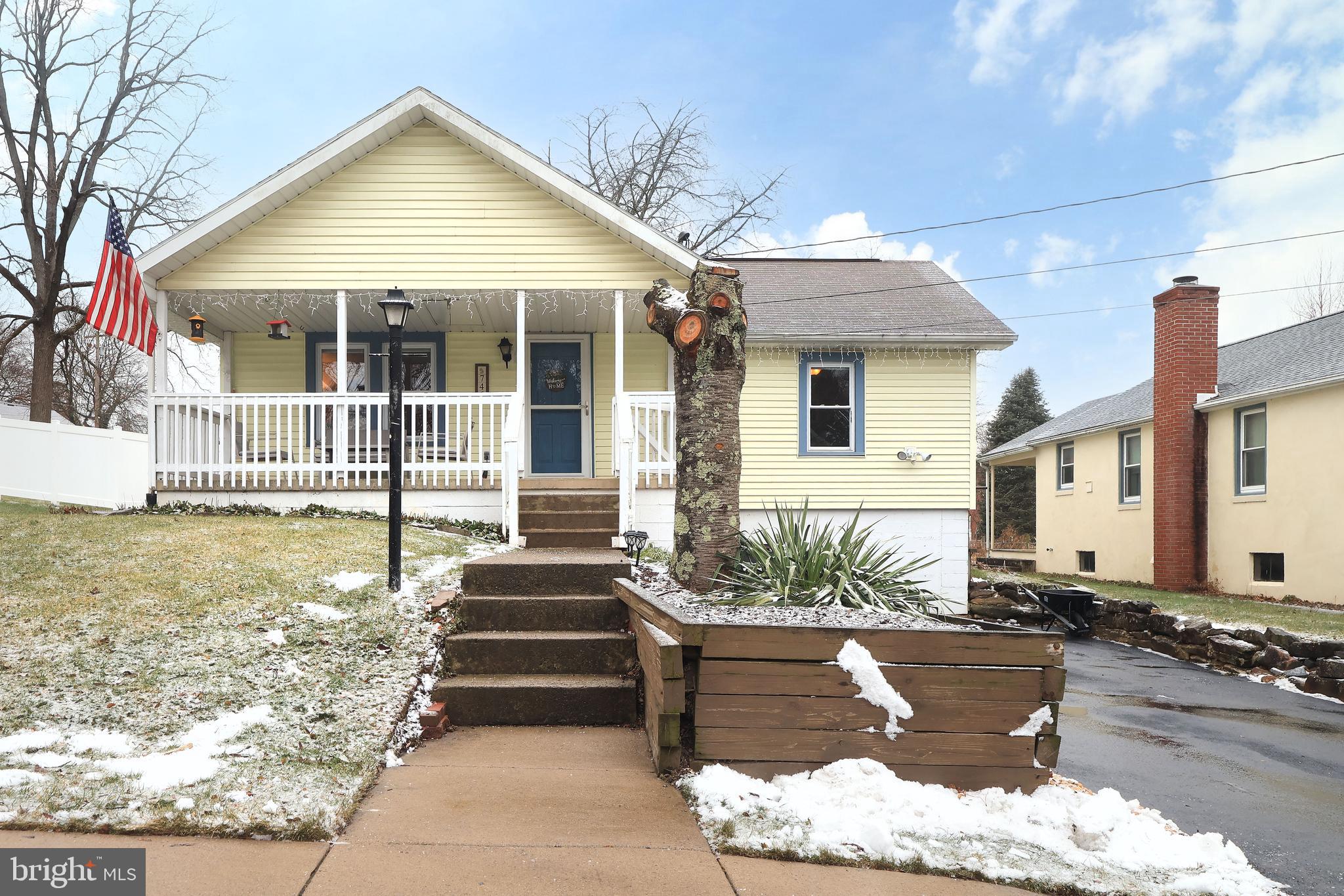 746 South Nixon Road Pine Grove Mills, PA 16868 - Photo 2 of 38 a front view of a house with garden