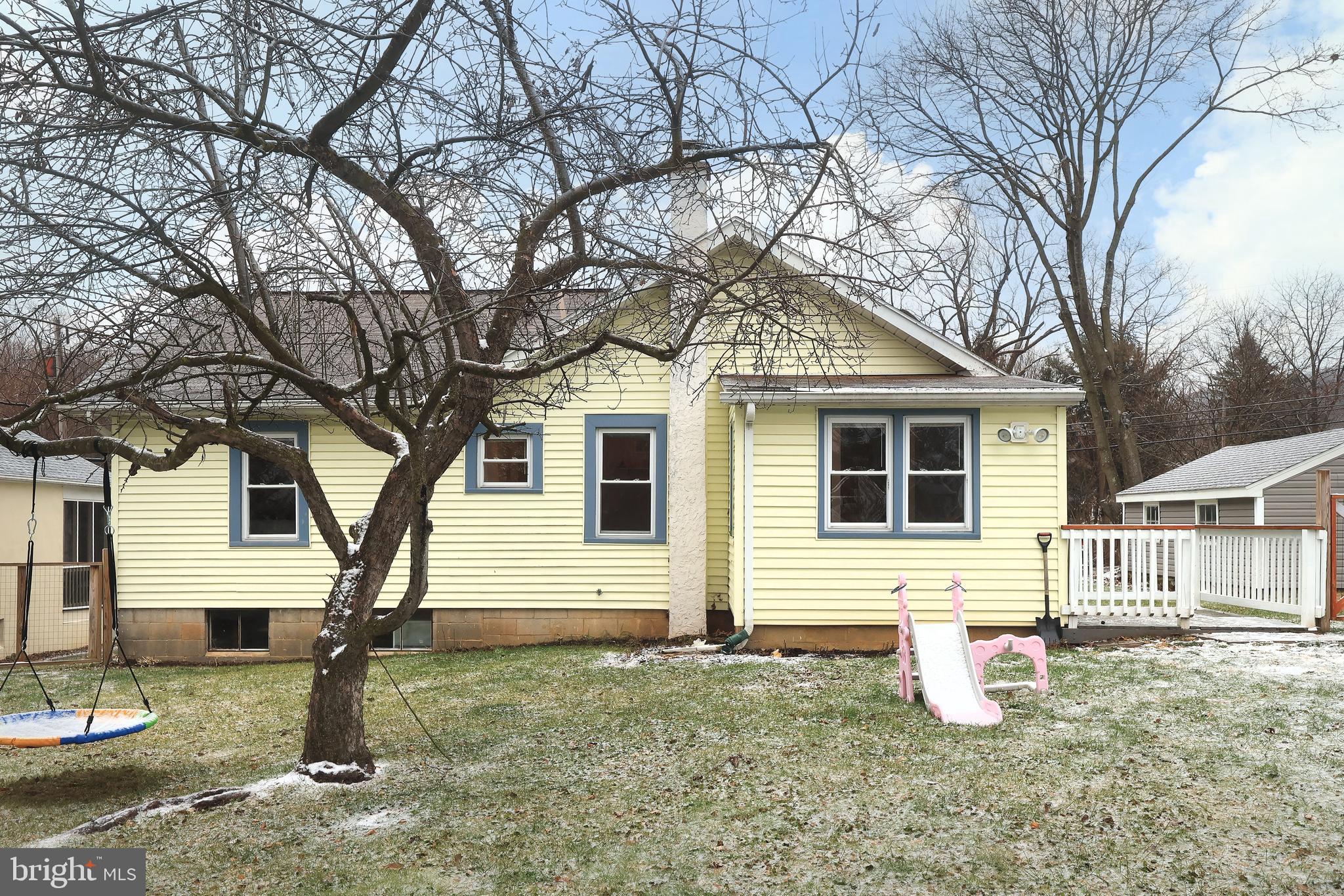 746 South Nixon Road Pine Grove Mills, PA 16868 - Photo 32 of 38 a front view of a house with garden