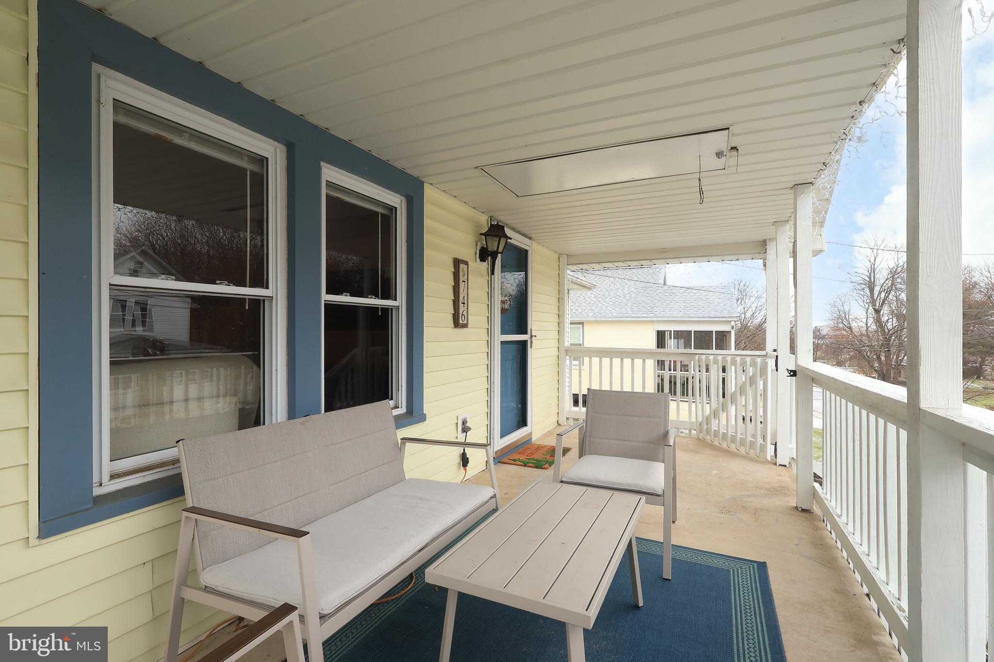 746 South Nixon Road Pine Grove Mills, PA 16868 - Photo 37 of 38 a living room with furniture and large windows