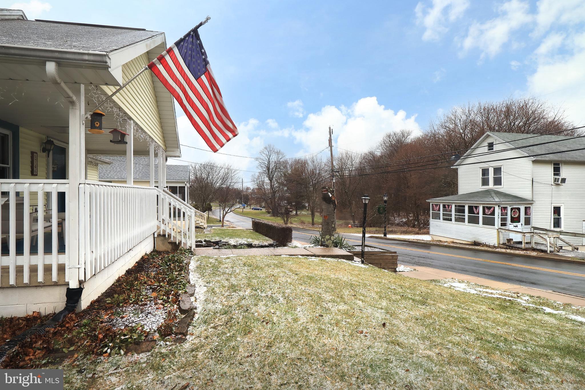 746 South Nixon Road Pine Grove Mills, PA 16868 - Photo 38 of 38 a backyard of a house with table and chairs