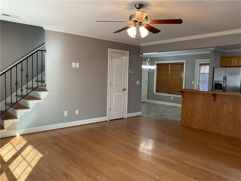 10 Sarah Street Northwest Rome, GA 30165 - Photo 4 of 14 wooden floor in an empty room with a window