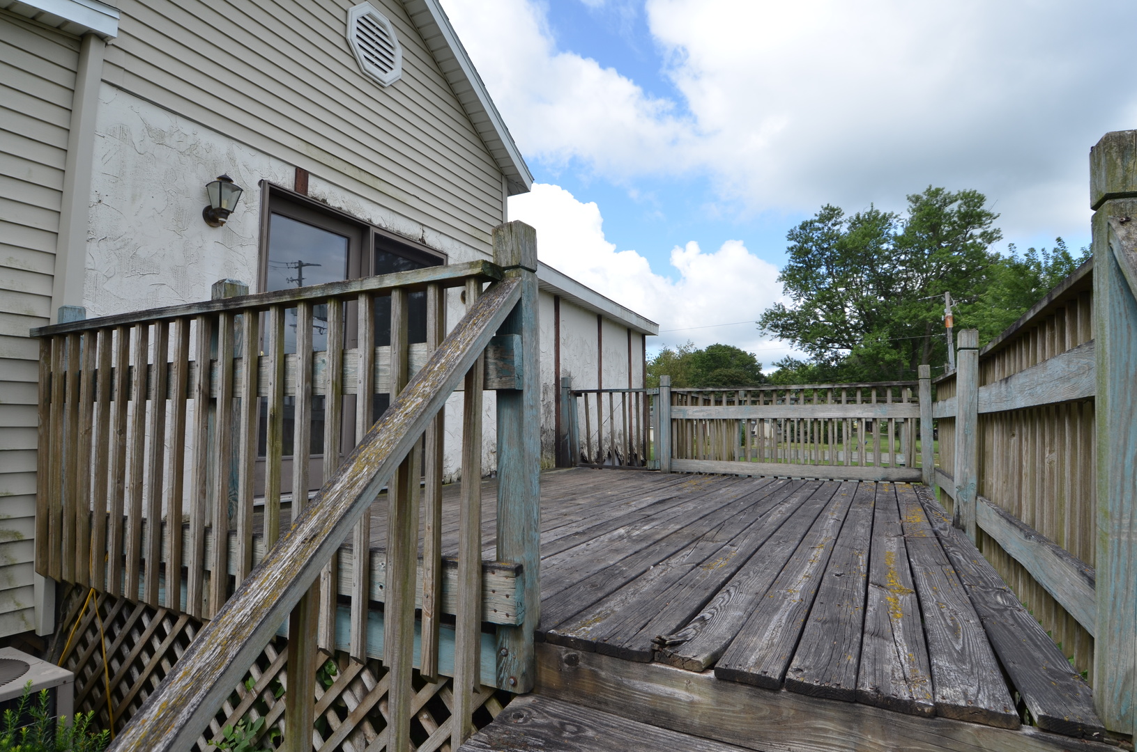 103 North Lane Street Ransom, IL 60470 - Photo 12 of 14 a view of deck with wooden floor and fence