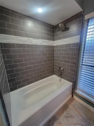 a bathroom with a bathtub