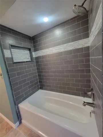 a bathroom with a bathtub