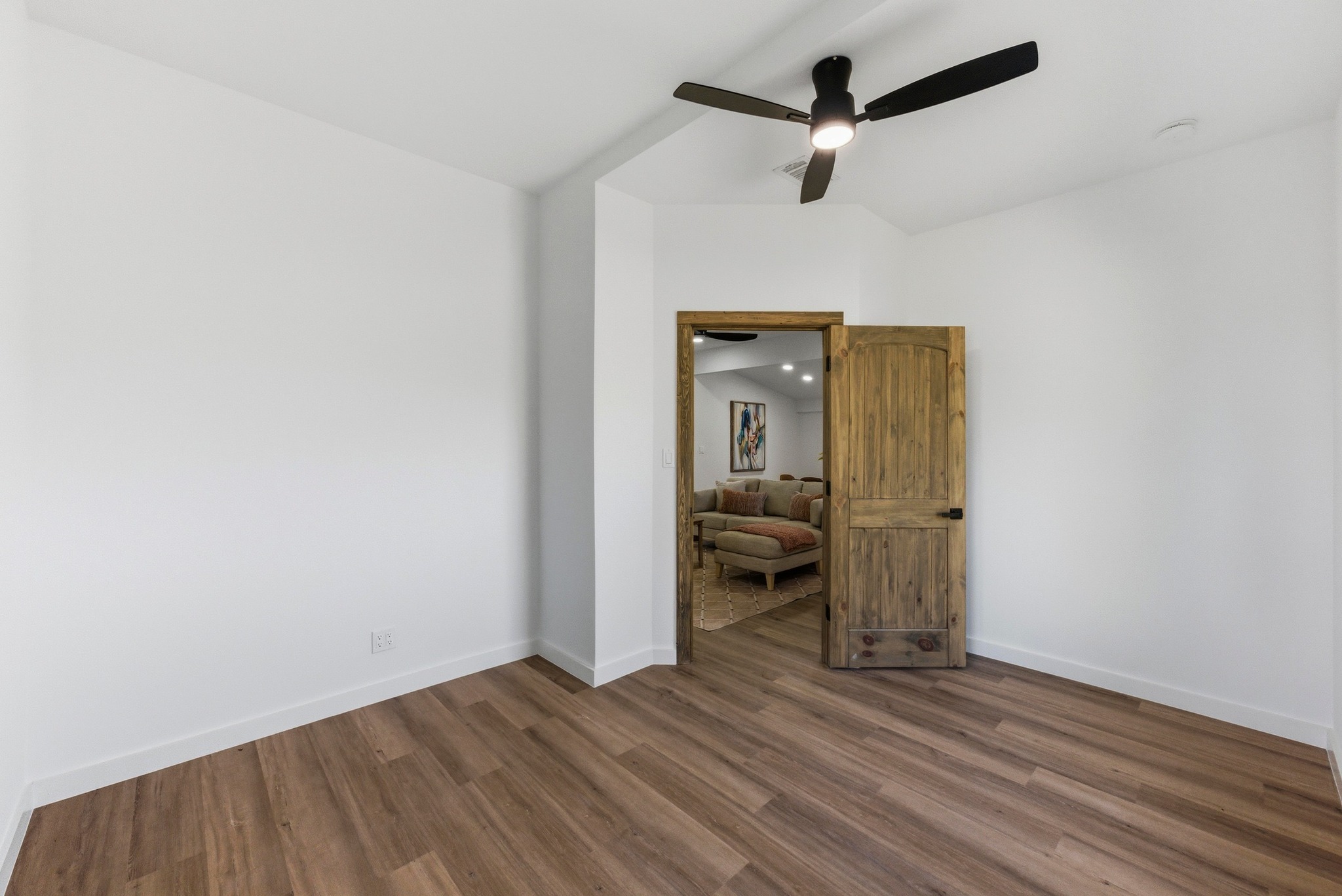 2649 Crazyhorse Pass Austin, TX 78734 - Photo 24 of 40 Another view of the dedicated office with dark wood-type flooring and ceiling fan