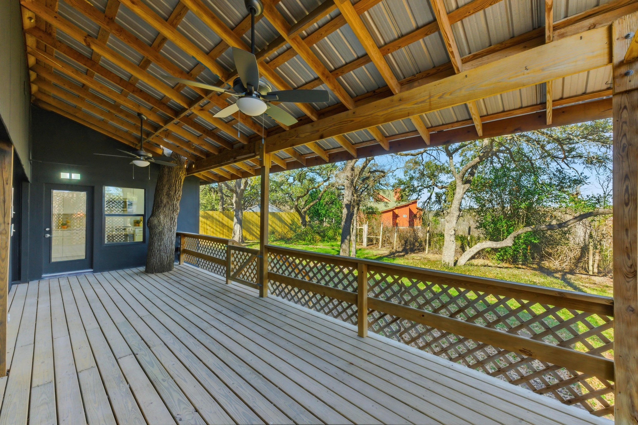 2649 Crazyhorse Pass Austin, TX 78734 - Photo 27 of 40 Covered back deck with double ceiling fans