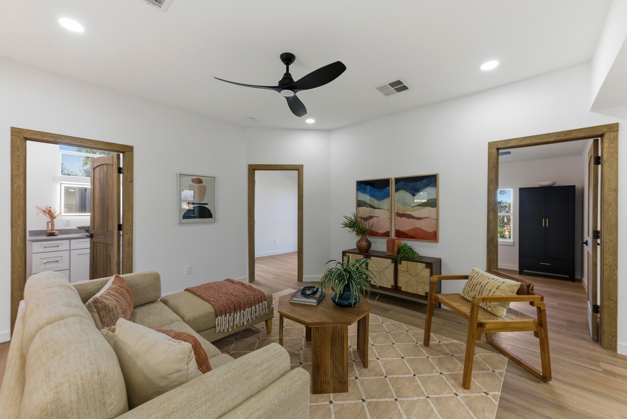 2649 Crazyhorse Pass Austin, TX 78734 - Photo 5 of 40 Living room with light wood finished floors, a ceiling fan, and recessed lighting