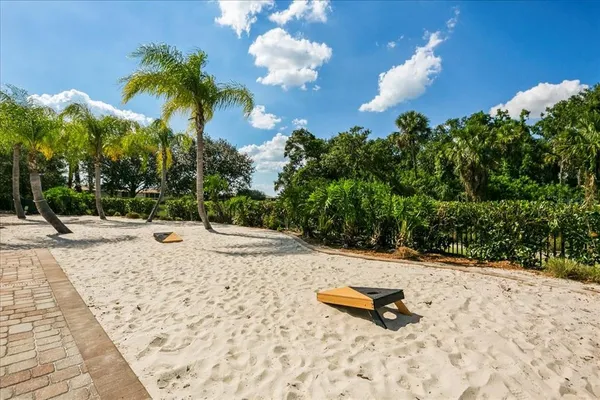 a view of a patio with a table and chairs