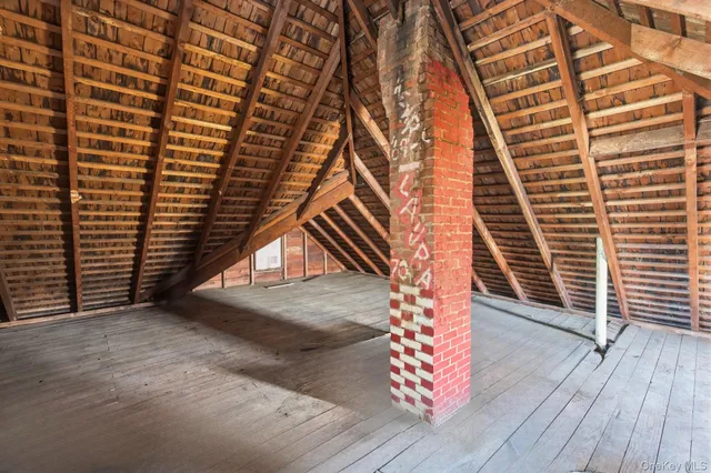 a view of empty room with windows