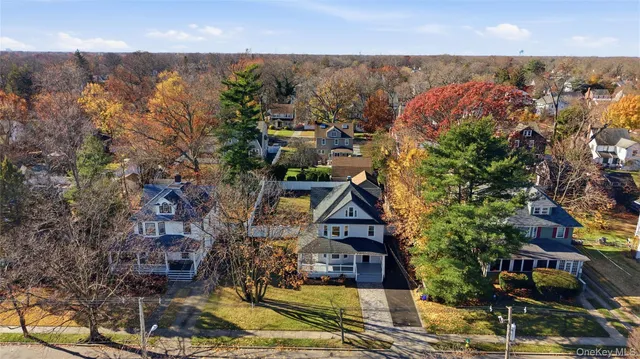 a view of a swimming pool with an outdoor space and seating area