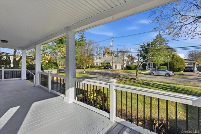 a view of a porch and garden