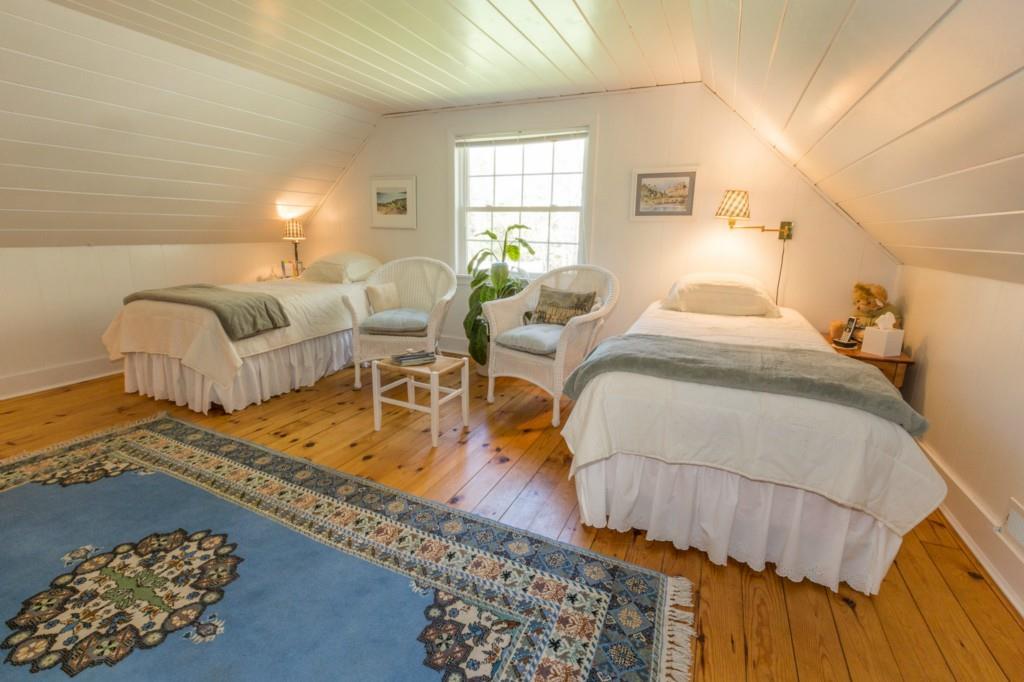 8 Hackelton Road Chamberlain, ME 04541 - Photo 16 of 28 Upstairs Bedroom with Pine Floors