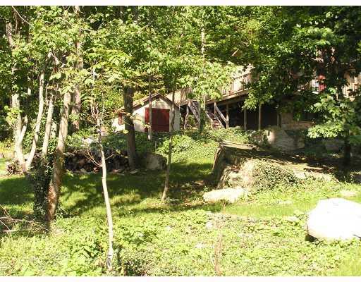 194 Snowshoe Road Acme, PA 15610 - Photo 14 of 14 Exterior Front. front yard and shed