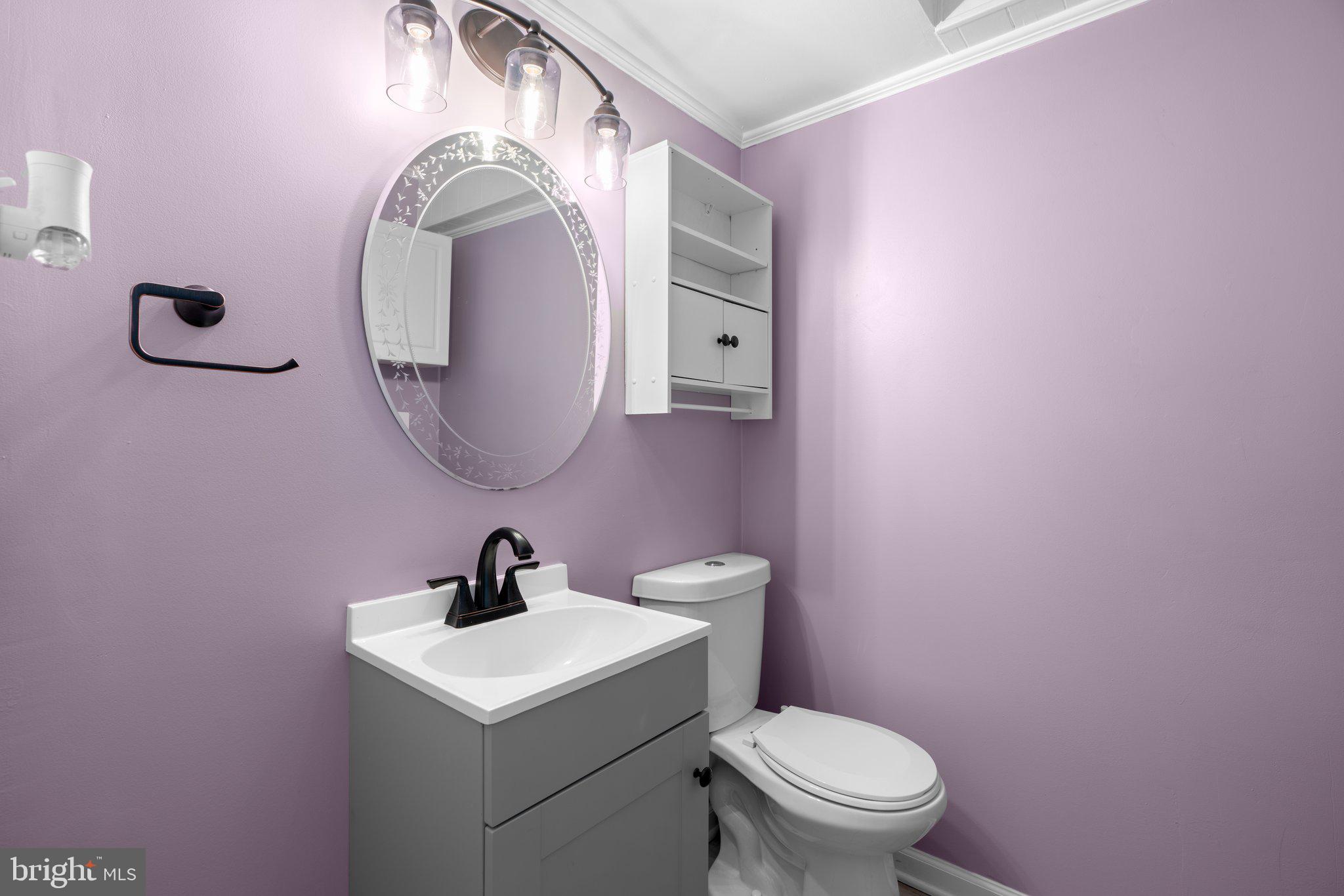 737 Chapelgate Drive Odenton, MD 21113 - Photo 12 of 31 Main level half bathroom