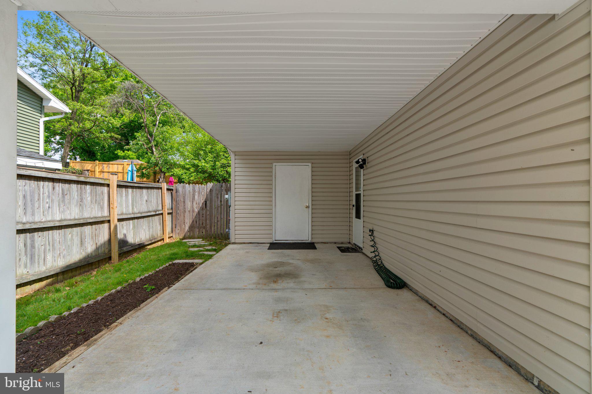 737 Chapelgate Drive Odenton, MD 21113 - Photo 27 of 31 Carport with storage/utility shed