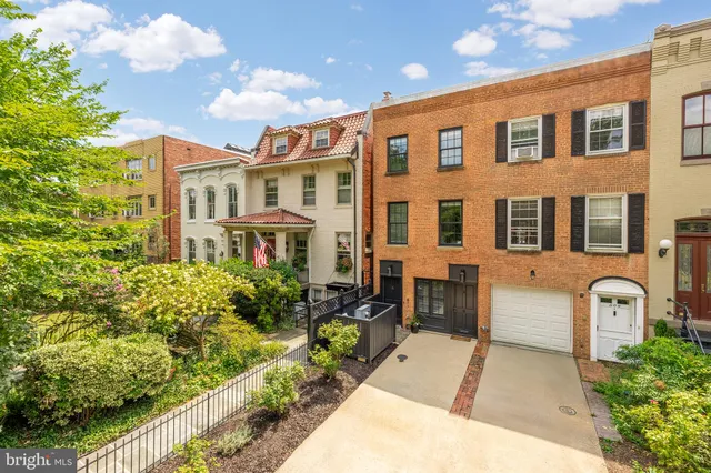 a front view of a multi story residential apartment building