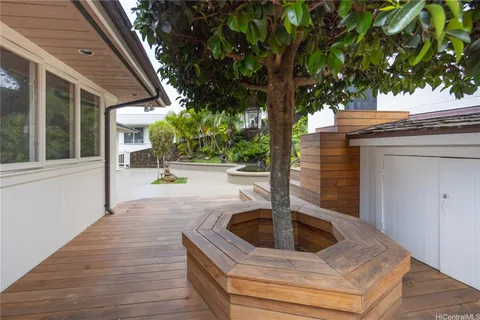 a view of a city street from a balcony