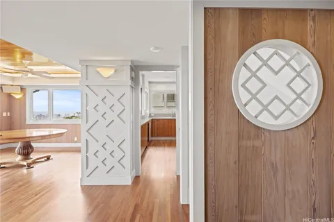 an outdoor view with swimming pool and wooden floor