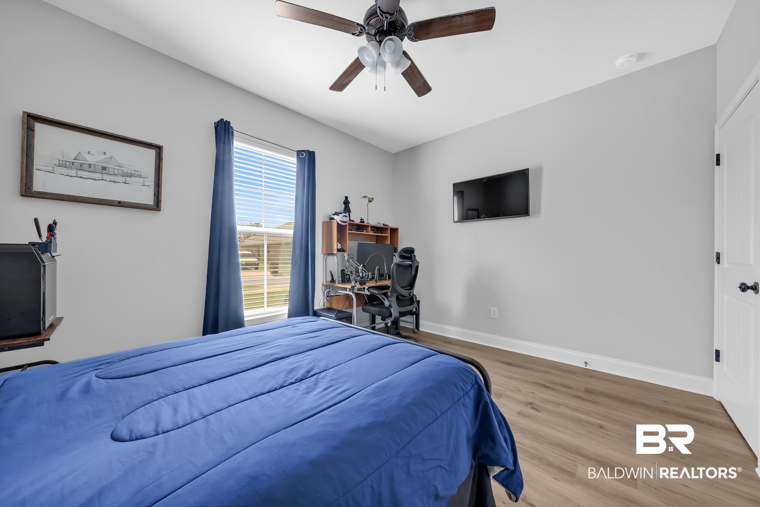 1176 Stella Road Foley, AL 36535 - Photo 28 of 40 Bedroom featuring wood finished floors and ceiling fan