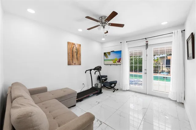 a living room with furniture and a window