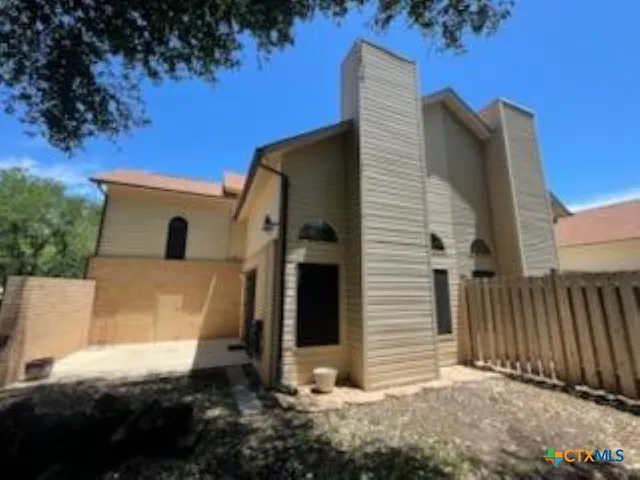 a view of outdoor space and swimming pool
