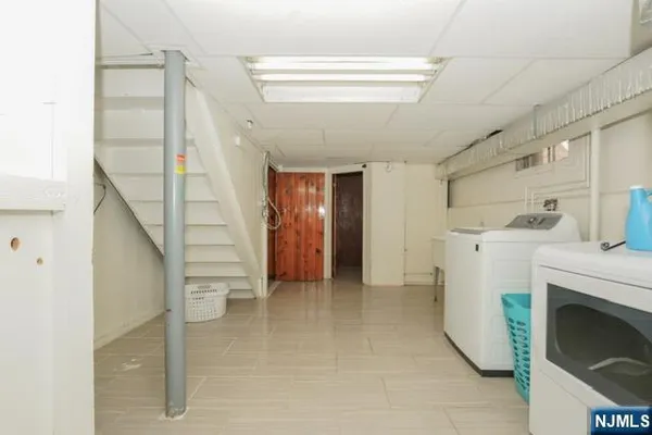 a view of hallway with washer and dryer