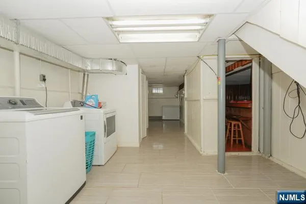 a utility room with cabinets