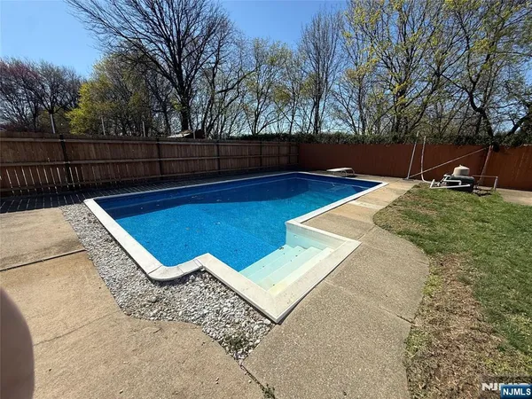 a view of outdoor space with swimming pool