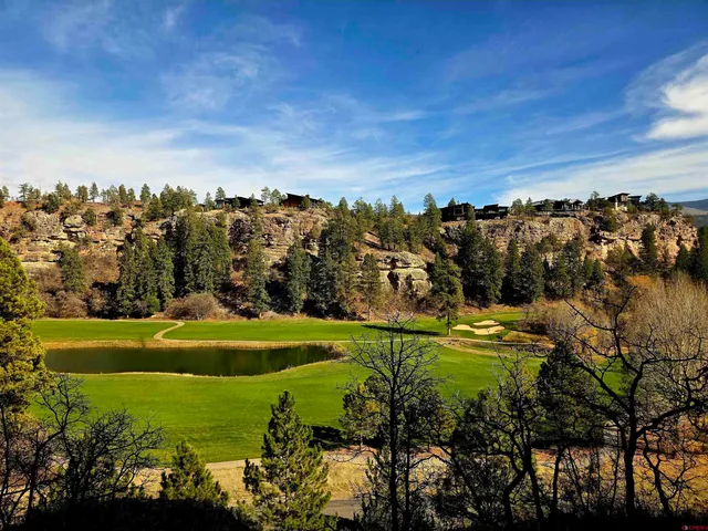a view of a golf course with a yard
