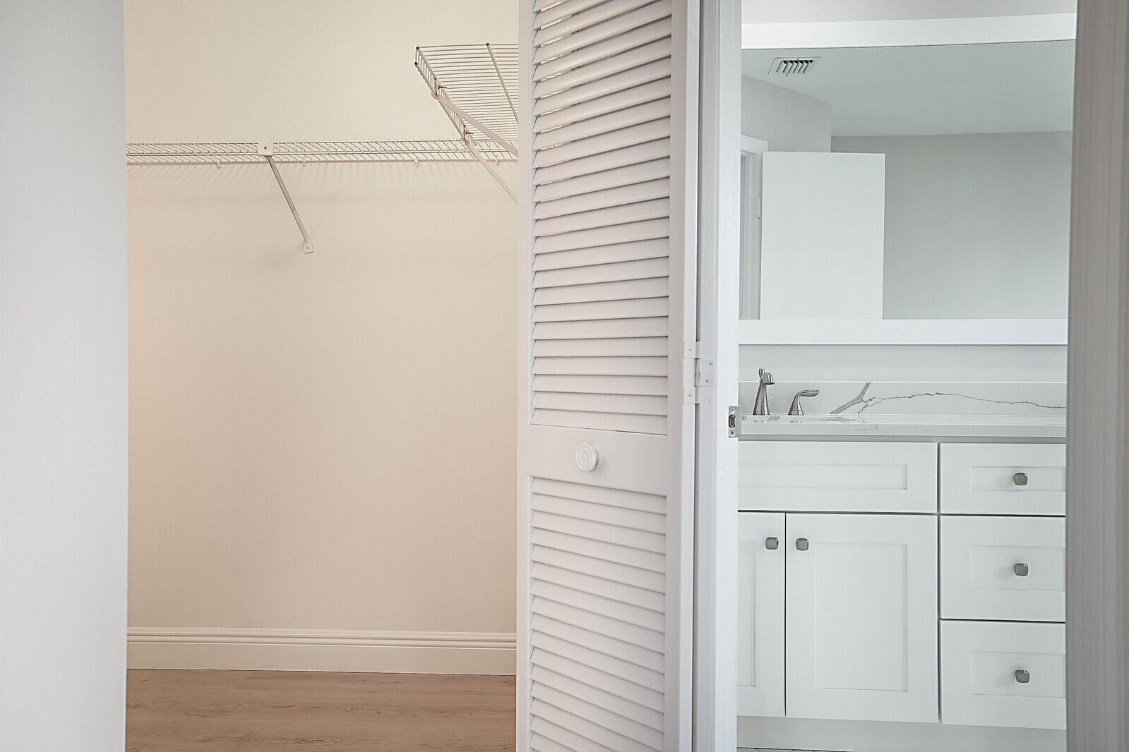 6819 Via Regina Boca Raton, FL 33433 - Photo 29 of 39 a bathroom with a shower and vanity