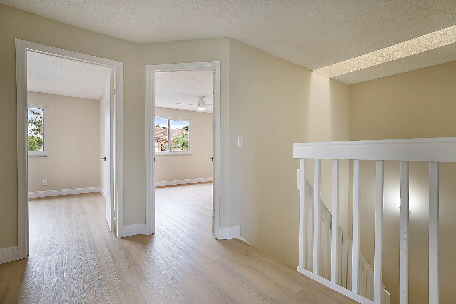 6819 Via Regina Boca Raton, FL 33433 - Photo 32 of 39 a view of entryway with wooden floor