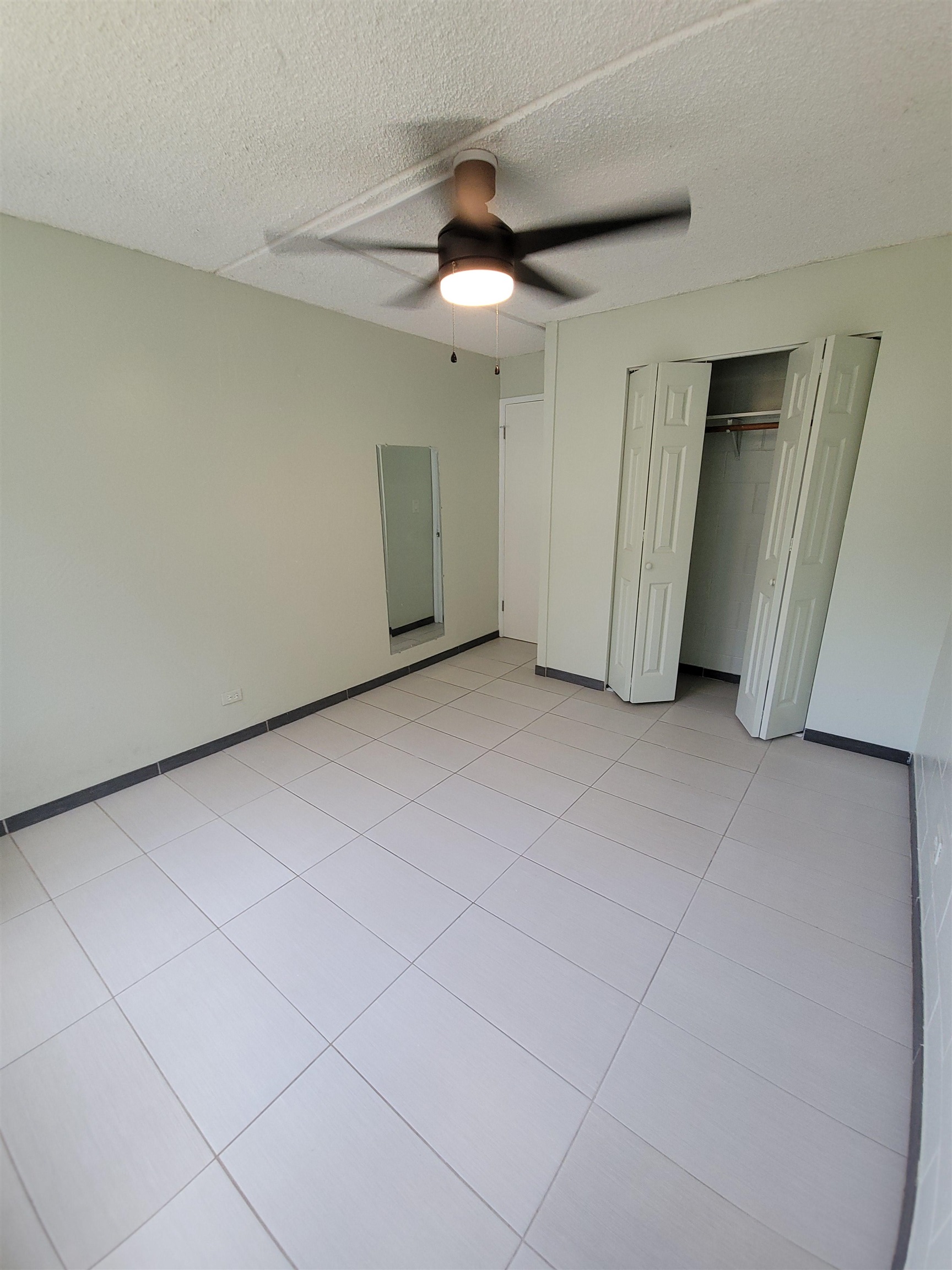 111 Kahului Beach Road, Unit B213 Kahului, HI 96732 - Photo 18 of 28 an empty room with closet