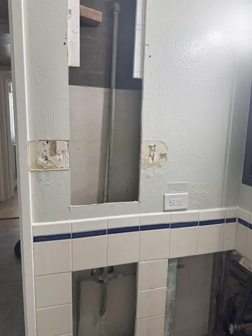 a view of outdoor space with swimming pool and sitting space