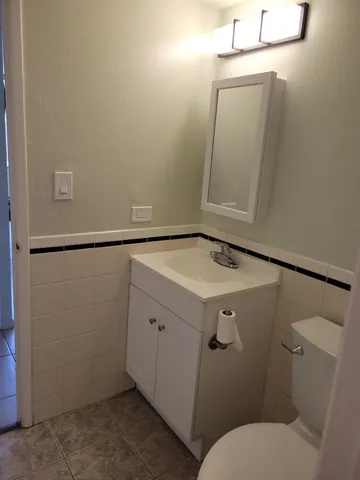 a bathroom with a sink and mirror