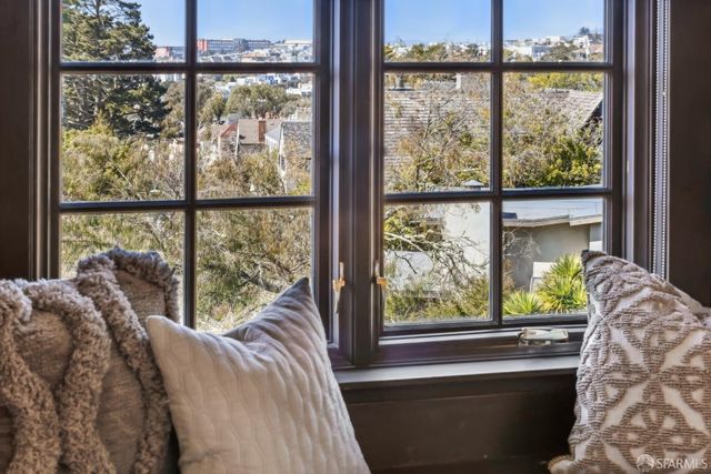 a view of backyard with a garden and plants