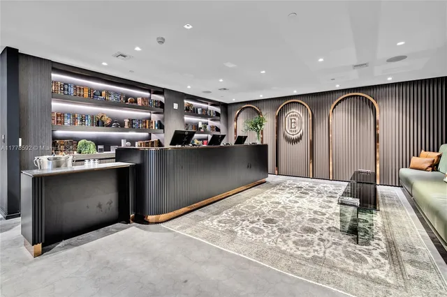 a room with chairs city view and outdoor seating