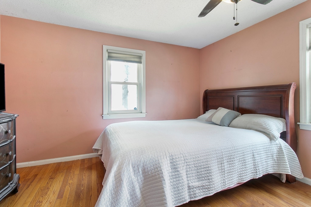 494 Tiffany Street Springfield, MA 01108 - Photo 23 of 40 a bedroom with a bed and a window