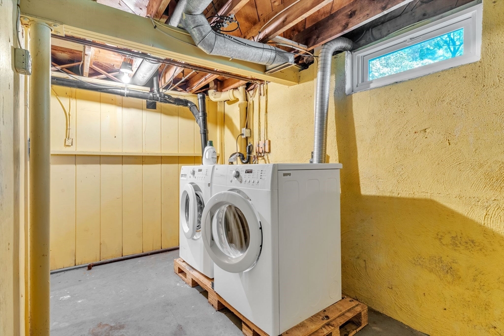 494 Tiffany Street Springfield, MA 01108 - Photo 32 of 40 a utility room with dryer and washer