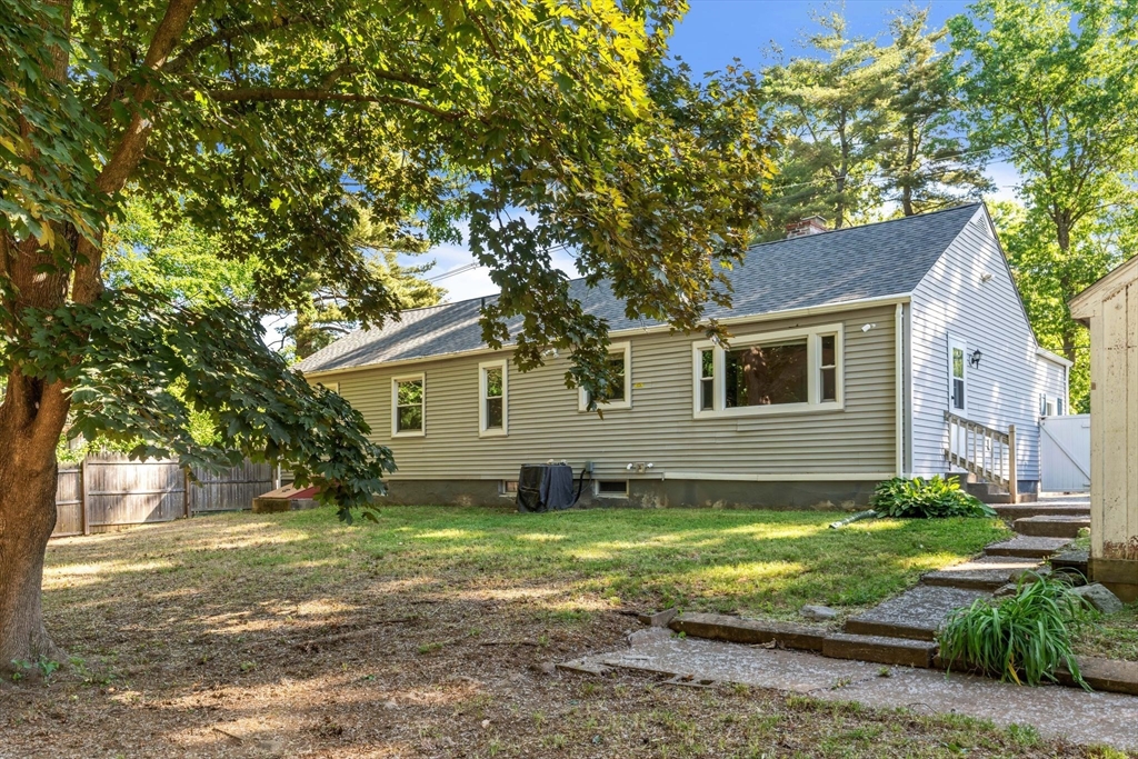 494 Tiffany Street Springfield, MA 01108 - Photo 38 of 40 a view of a house with yard and tree s