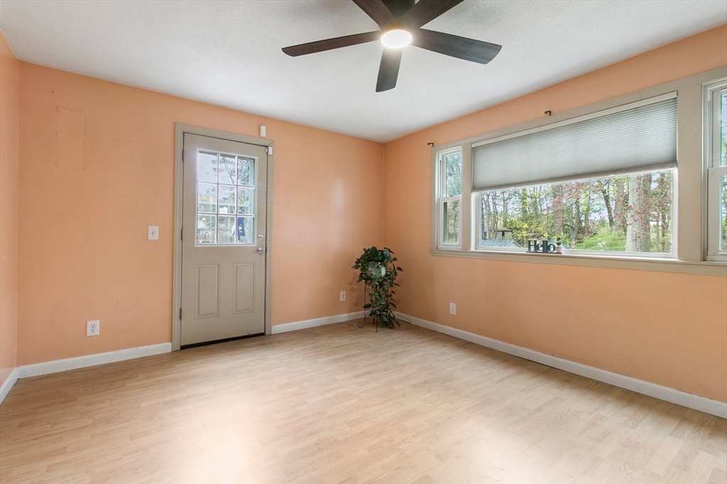 494 Tiffany Street Springfield, MA 01108 - Photo 6 of 40 a view of an empty room with a window