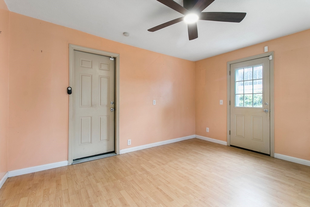 494 Tiffany Street Springfield, MA 01108 - Photo 7 of 40 an empty room with closet and windows