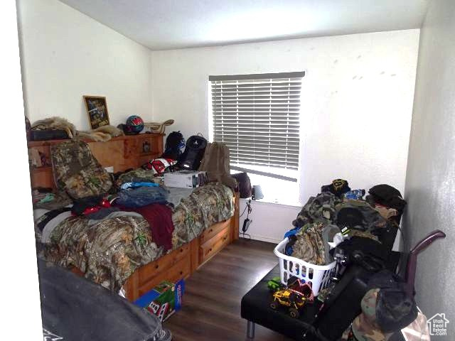 34685 Highway 30 Georgetown, ID 83239 - Photo 9 of 21 Bedroom featuring dark wood-type flooring