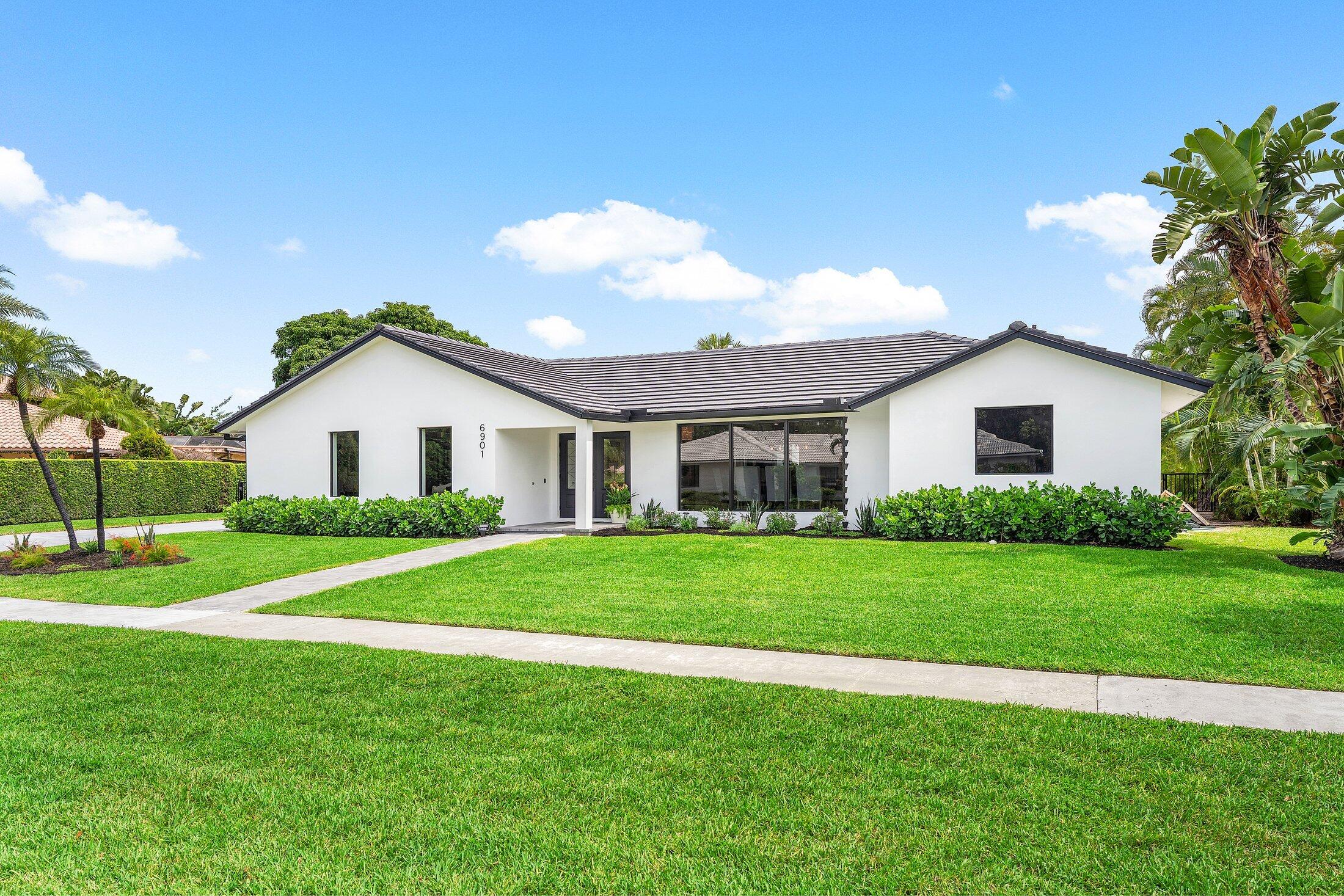 6901 Giralda Circle Boca Raton, FL 33433 - Photo 1 of 83 a view of a house with a yard