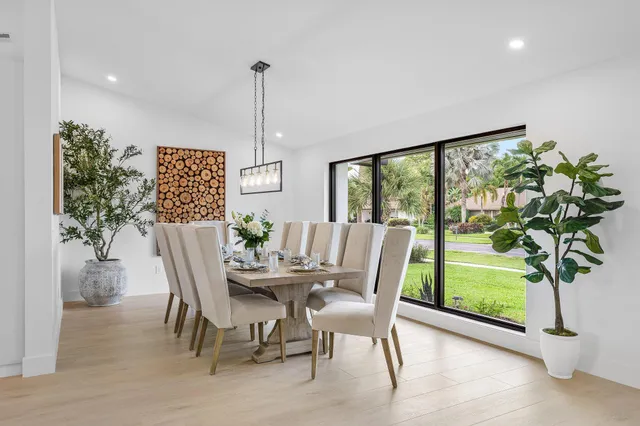 a bedroom with a bed lamp closet and window