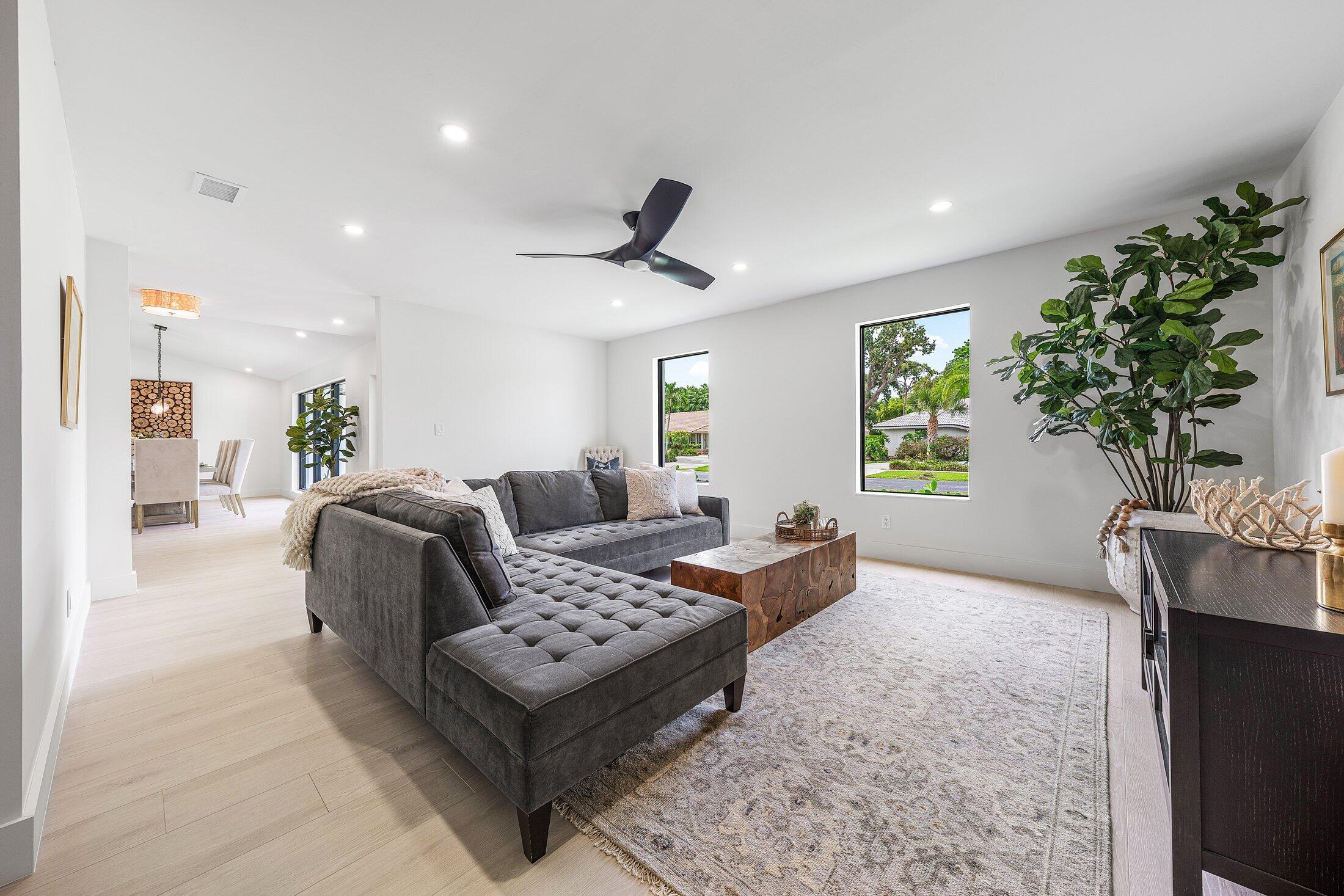 6901 Giralda Circle Boca Raton, FL 33433 - Photo 14 of 83 a living room with furniture and a potted plant